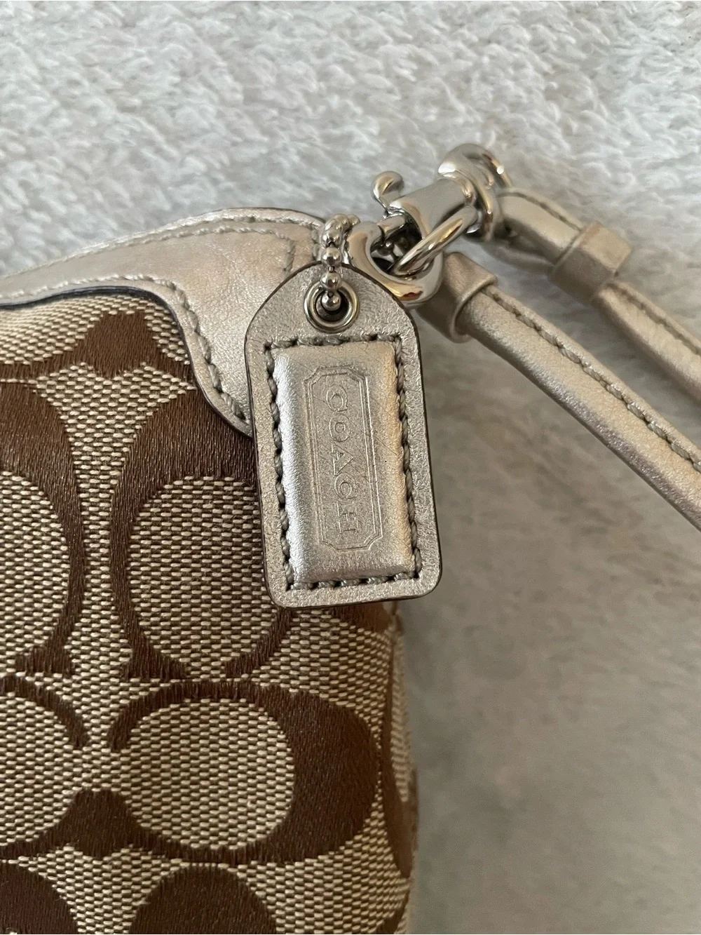 NWOT Coach Brown Signature Canvas Wristlet with Metallic Silver Trim